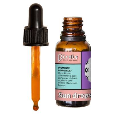 Buteliukas Birdie Nutrition Sun Drops su pipete ant šviesaus fono
